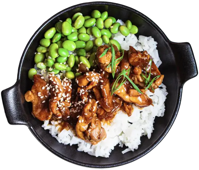 Black bowl with glazed chicken, white rice and edamame