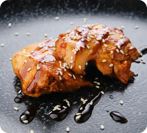 Sakura of Japan teriyaki chicken drizzled with glaze and sesame seeds