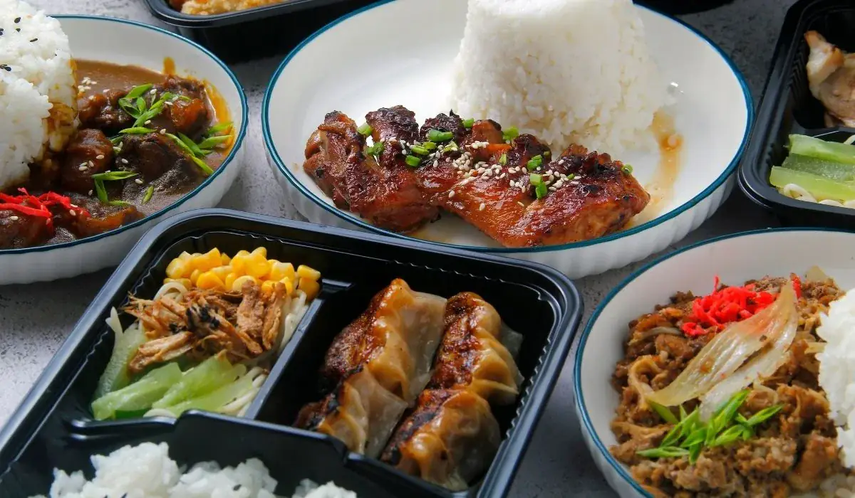 Sakura of Japan teriyaki takeout bento with rice, grilled chicken, gyoza